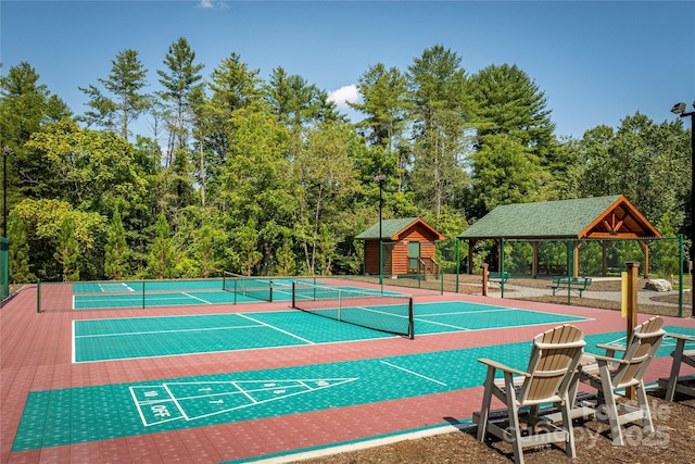 5684 Low Country Rd Unit Cb2, Lenoir, NC 28645 - surrounding community with a tennis court, shuffleboard, view of scattered trees, and a gazebo