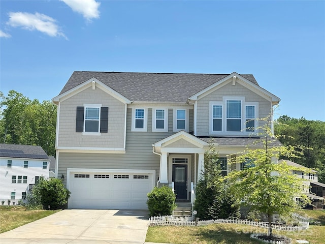 17121 Carolina Pine Row, Charlotte, NC 28278 - craftsman house featuring driveway, roof with shingles, and a garage