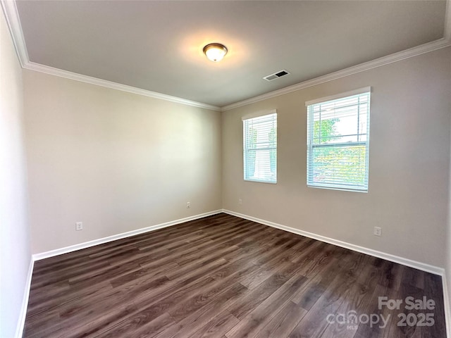17121 Carolina Pine Row, Charlotte, NC 28278 - unfurnished room featuring dark wood-type flooring, visible vents, baseboards, and ornamental molding