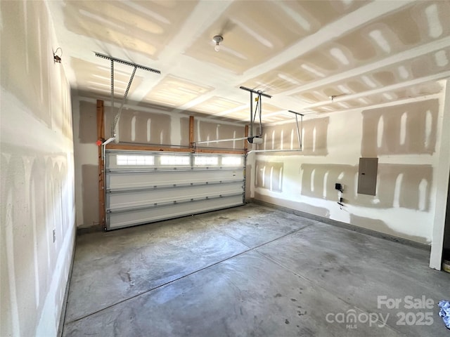 17121 Carolina Pine Row, Charlotte, NC 28278 - garage with electric panel and a garage door opener