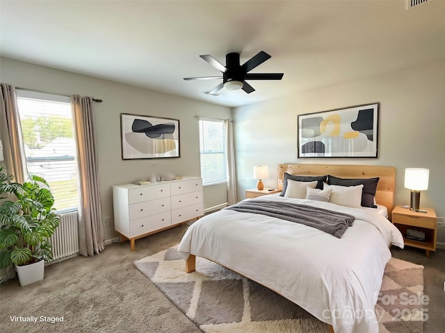 17121 Carolina Pine Row, Charlotte, NC 28278 - bedroom with carpet flooring, radiator, visible vents, baseboards, and a ceiling fan
