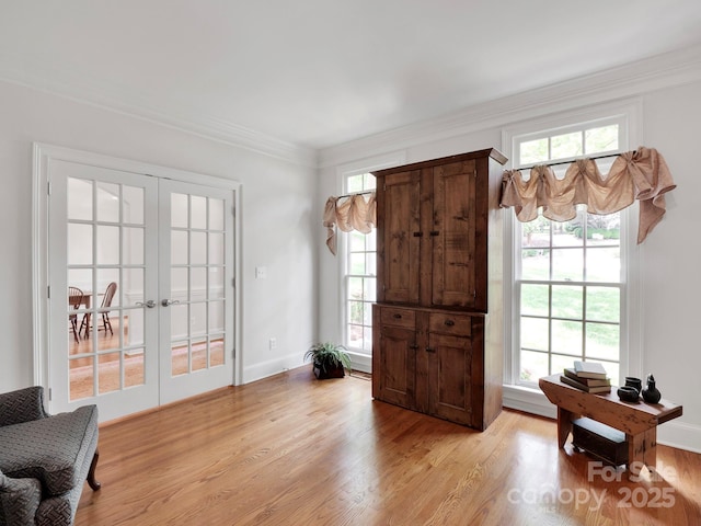 7716 Seton House Ln, Charlotte, NC 28277 - entrance foyer with french doors, light wood-style flooring, healthy amount of natural light, and ornamental molding