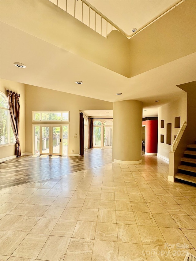 255 Charlotte Ann Ln, Hickory, NC 28601 - empty room with baseboards, french doors, and a towering ceiling