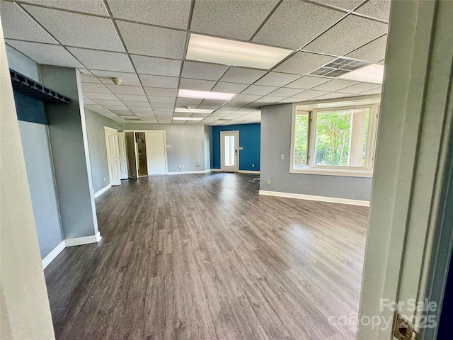 255 Charlotte Ann Ln, Hickory, NC 28601 - spare room featuring wood finished floors, a paneled ceiling, and baseboards