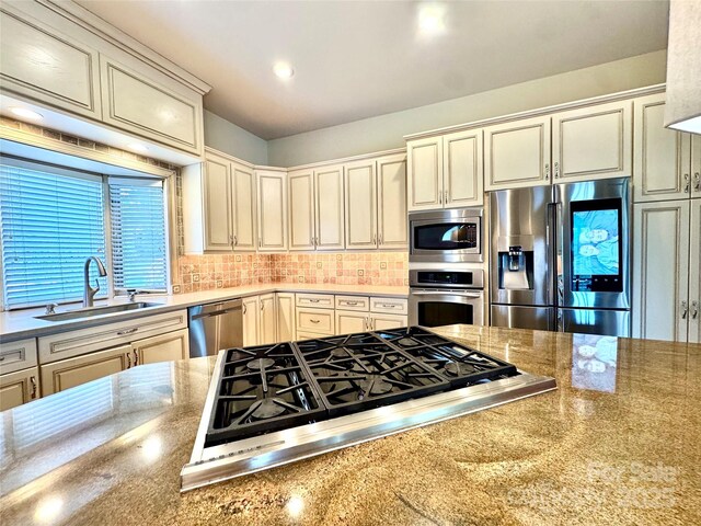 255 Charlotte Ann Ln, Hickory, NC 28601 - kitchen with tasteful backsplash, recessed lighting, light stone counters, stainless steel appliances, and a sink