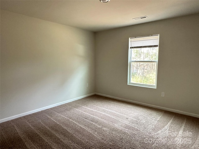 1345 Nia Rd, Charlotte, NC 28215 - empty room featuring baseboards, visible vents, and carpet floors
