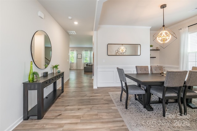 115 Haddonsfield Dr, Mooresville, NC 28115 - dining space featuring crown molding, recessed lighting, light wood finished floors, and visible vents