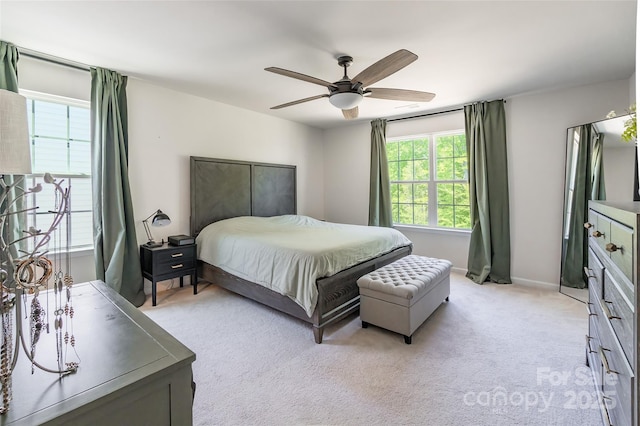 115 Haddonsfield Dr, Mooresville, NC 28115 - bedroom with a ceiling fan, light carpet, and multiple windows