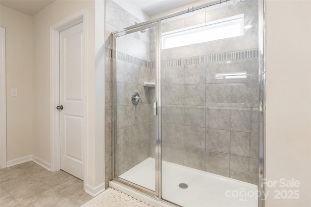 115 Haddonsfield Dr, Mooresville, NC 28115 - bathroom featuring baseboards and a stall shower