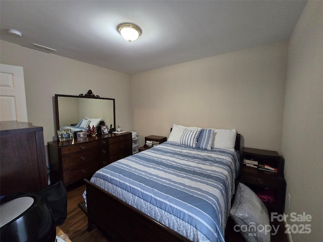 615 Tremont St, Troy, NC 27371 - bedroom with wood finished floors and visible vents