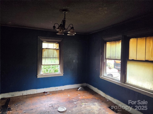 721 S Spruce St, Rock Hill, SC 29730 - empty room featuring a chandelier and baseboards