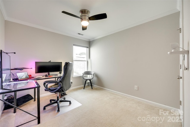 carpeted office space with crown molding, baseboards, ceiling fan, and visible vents