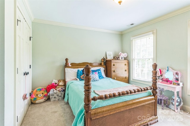 bedroom featuring crown molding, baseboards, visible vents, and carpet