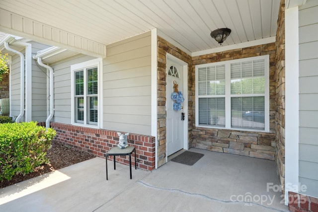 108 Ivy Ct, Morganton, NC 28655 - view of exterior entry with a porch and stone siding