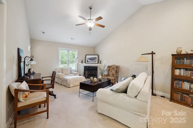 108 Ivy Ct, Morganton, NC 28655 - living area with light carpet, a fireplace, a ceiling fan, lofted ceiling, and visible vents