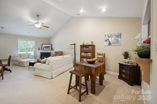 108 Ivy Ct, Morganton, NC 28655 - living room with light carpet, a fireplace, a ceiling fan, baseboards, and vaulted ceiling