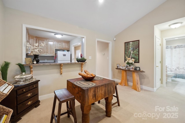 108 Ivy Ct, Morganton, NC 28655 - dining space featuring baseboards, light colored carpet, and lofted ceiling