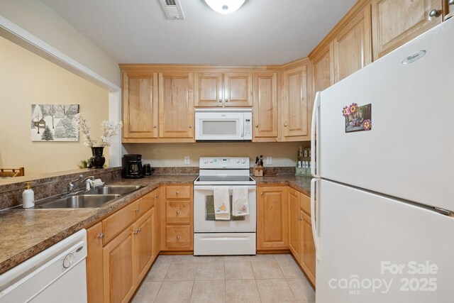 108 Ivy Ct, Morganton, NC 28655 - kitchen featuring visible vents, a sink, light tile patterned floors, light brown cabinets, and white appliances