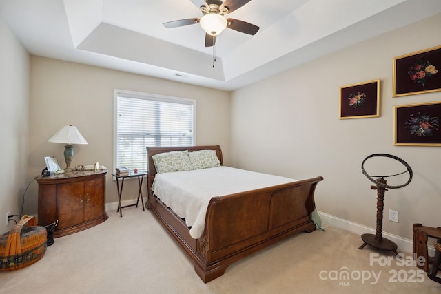 108 Ivy Ct, Morganton, NC 28655 - bedroom with a tray ceiling, visible vents, light carpet, and baseboards