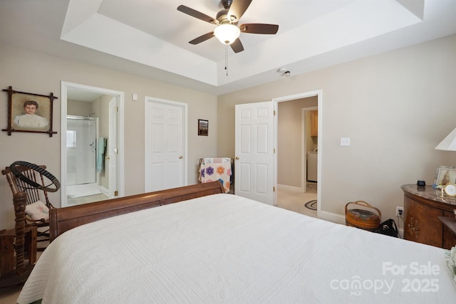 108 Ivy Ct, Morganton, NC 28655 - bedroom with ceiling fan, washer / clothes dryer, a raised ceiling, baseboards, and ensuite bathroom
