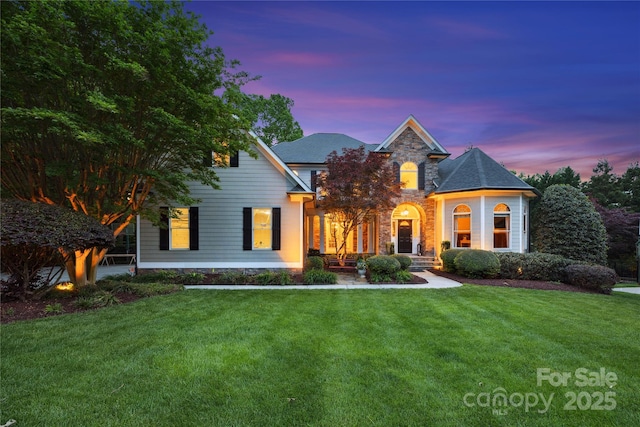 18730 Floyd Ct, Davidson, NC 28036 - traditional-style home featuring a front lawn and stone siding