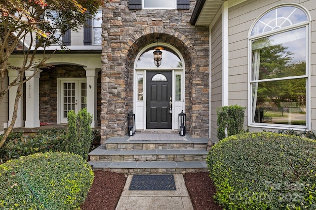 18730 Floyd Ct, Davidson, NC 28036 - property entrance with stone siding