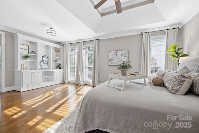 18730 Floyd Ct, Davidson, NC 28036 - bedroom with multiple windows, wood finished floors, ornamental molding, a raised ceiling, and access to outside