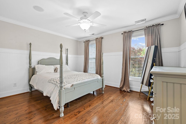 18730 Floyd Ct, Davidson, NC 28036 - bedroom featuring a wainscoted wall, multiple windows, wood finished floors, ceiling fan, and crown molding