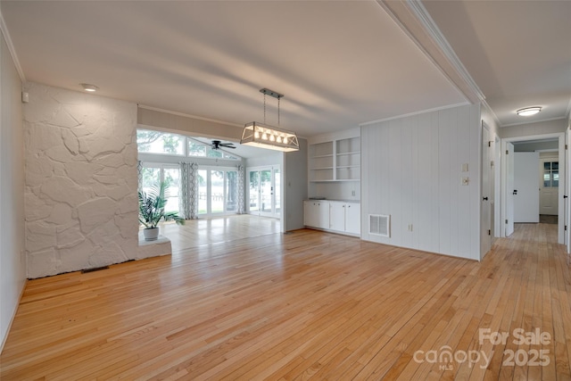 5200 Masons Ferry Rd, Clover, SC 29710 - unfurnished living room featuring ornamental molding, light wood-type flooring, and a ceiling fan