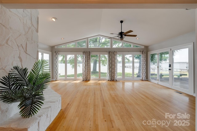 5200 Masons Ferry Rd, Clover, SC 29710 - unfurnished living room featuring light wood-style floors, vaulted ceiling, ceiling fan, and a water view