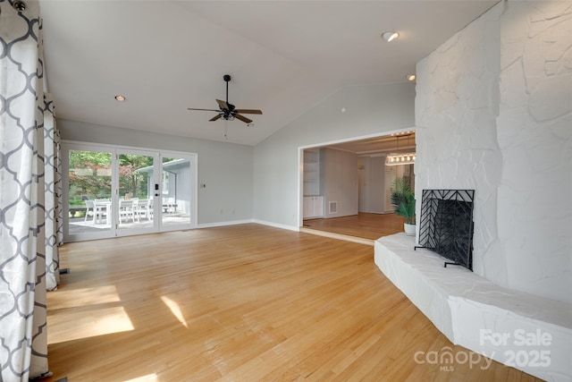 5200 Masons Ferry Rd, Clover, SC 29710 - unfurnished living room with ceiling fan, vaulted ceiling, light wood-type flooring, a fireplace, and recessed lighting