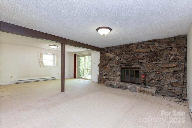 unfurnished living room with a fireplace, baseboard heating, and a textured ceiling