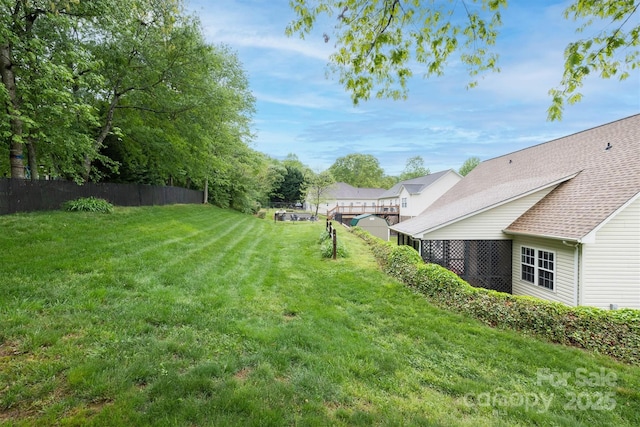view of yard with fence
