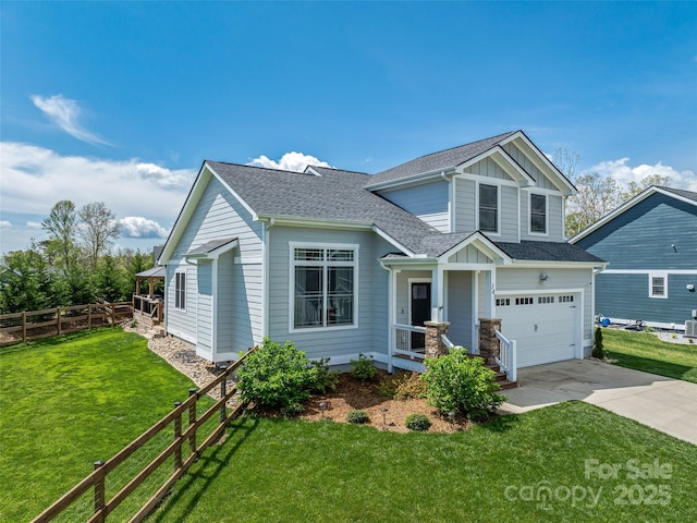view of front of house featuring driveway, board and batten siding, an attached garage, fence, and roof with shingles
