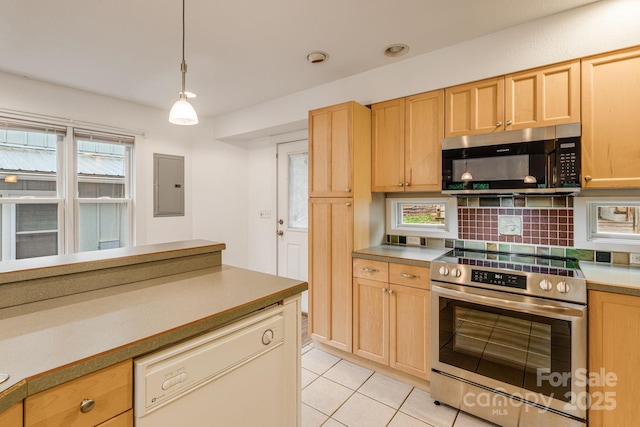 19 Castle St, Asheville, NC 28803 - kitchen featuring stainless steel appliances, light brown cabinetry, light tile patterned flooring, electric panel, and backsplash