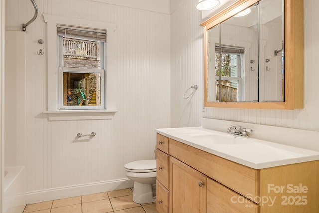 19 Castle St, Asheville, NC 28803 - full bathroom with tile patterned flooring, toilet, vanity, and baseboards