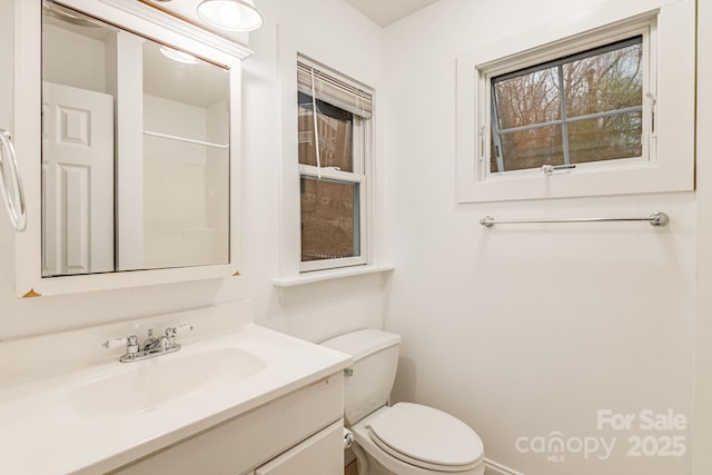 19 Castle St, Asheville, NC 28803 - bathroom with vanity, toilet, and baseboards