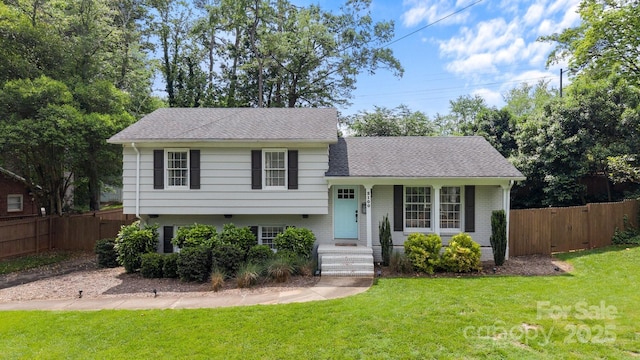 2100 Shadyview Dr, Charlotte, NC 28210 - tri-level home with brick siding, a shingled roof, and a gate