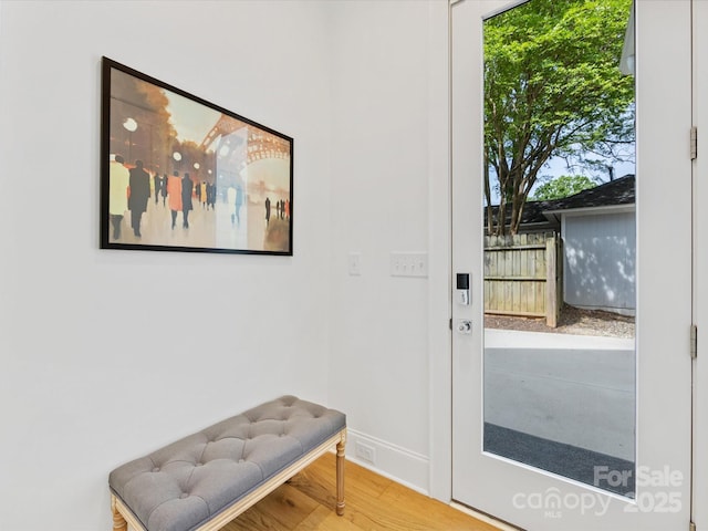 1614 Brook Rd, Charlotte, NC 28205 - doorway to outside with baseboards and wood finished floors