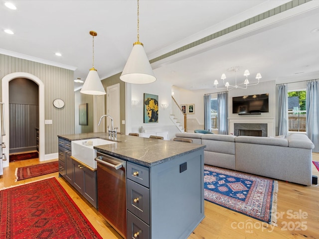 1614 Brook Rd, Charlotte, NC 28205 - kitchen with light wood finished floors, dishwasher, crown molding, and a sink