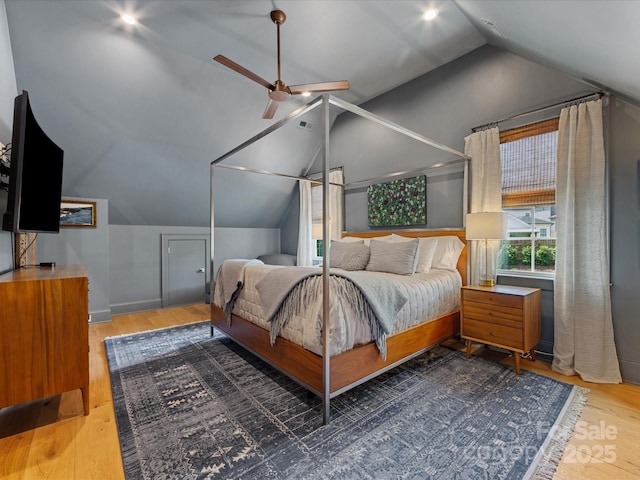 1614 Brook Rd, Charlotte, NC 28205 - bedroom with baseboards, wood finished floors, visible vents, and vaulted ceiling