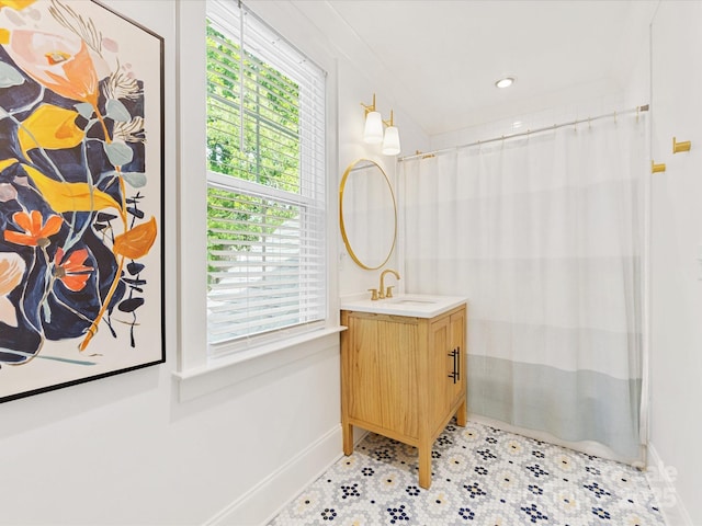 1614 Brook Rd, Charlotte, NC 28205 - bathroom featuring vanity, baseboards, and tile patterned floors