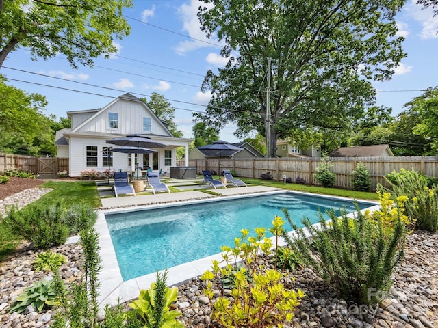 1614 Brook Rd, Charlotte, NC 28205 - view of pool featuring a lawn, a patio area, a fenced in pool, and a fenced backyard
