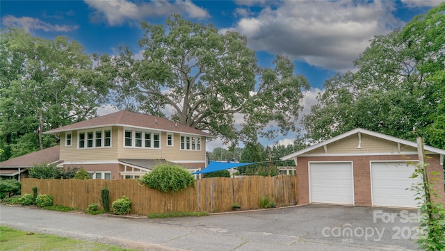 311 W Union St, Morganton, NC 28655 - view of front of home featuring fence and a detached garage