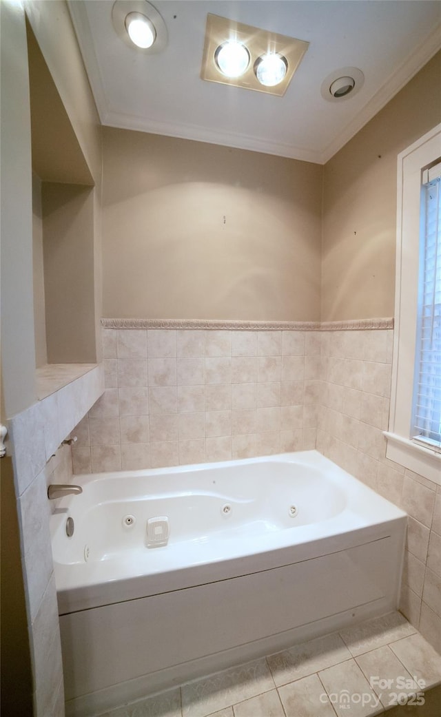 311 W Union St, Morganton, NC 28655 - bathroom with tile walls, tile patterned floors, crown molding, and a whirlpool tub