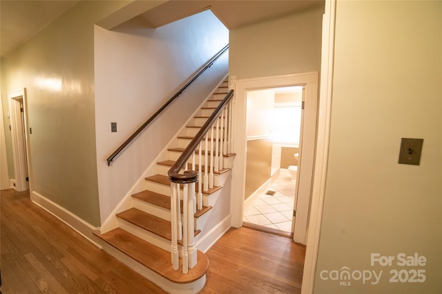 311 W Union St, Morganton, NC 28655 - stairs featuring baseboards and wood finished floors