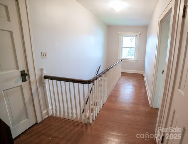 311 W Union St, Morganton, NC 28655 - hall with baseboards, an upstairs landing, and wood finished floors