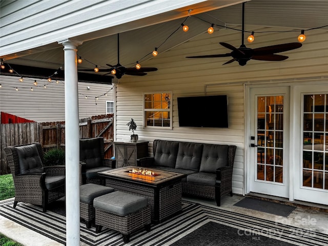 347 Wildbriar Rd Unit 28, Fletcher, NC 28732 - view of patio with ceiling fan and an outdoor living space with a fire pit