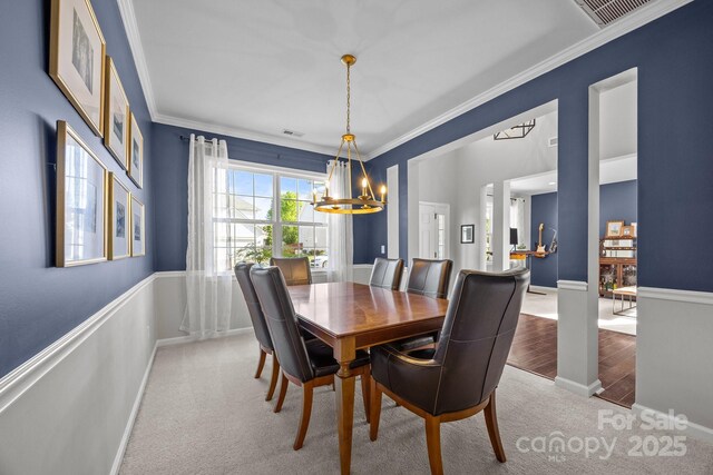 347 Wildbriar Rd Unit 28, Fletcher, NC 28732 - dining space with a chandelier, carpet flooring, ornamental molding, and baseboards