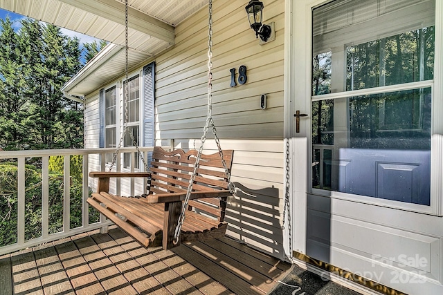 deck featuring covered porch
